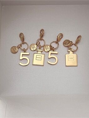 CHANEL Gold-Tone '5' and Perfume Bottle Charm Set